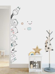 the wall decals in this children's room are designed to look like animals