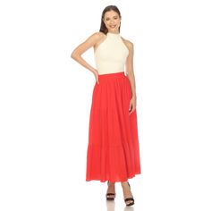 Elevate your fashion game with this flowy and effortlessly chic skirt. This maxi skirt from White Mark boasts a pleated design that adds texture, movement, and a touch of sophistication to your look. Dress it up or down as this skirt is incredibly versatile. Pair it with a tucked in blouse and heels for a sophisticated look or go for a more relaxed vibe with a tucked in tee and sandals and pair it with a jacket on chilly days. It’s perfect for various occasions and style preferences. Flowy Maxi Dress With Ruffled Skirt For Day Out, Flowy Lined Maxi Dress For Day Out, Day Out Voluminous Pleated Maxi Skirt, Chic Solid Color Gathered Maxi Skirt, Chic Tiered Maxi Dress With Relaxed Skirt, Chic Ruffled Maxi Length Skirt, Flowy Long Pleated Skirt For Day Out, Relaxed Fit Tiered Skirt Maxi Dress, Chic Ruffled Maxi Skirt