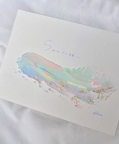 a card with an abstract painting on it