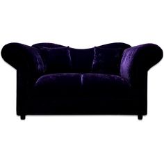 a purple couch sitting on top of a white floor