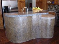 a kitchen with granite counter tops and stainless steel appliances