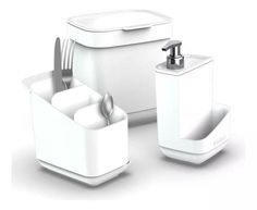 a white bathroom accessory set with toothbrush holder and soap dispenser