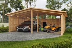 two cars are parked under a wooden carport in the grass next to a lawn mower