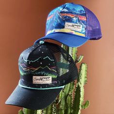 Feel the beat of your mountain heart. This lively pattern of jagged, brightly colored mountain and pine silhouettes takes you on a journey under a starry sky. Made from 100% recycled cotton and polyester mesh, this completely rad trucker is printed with our original Mountain Pulse design. Aqua snapback closure. Paintings Of Mountains, Dinosaur Mask, Mountain Paintings, Cat Nap, Live In The Now, Starry Sky, Recycled Cotton, Aqua Blue, Batik