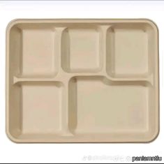 an empty tray with four compartments on it