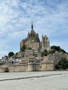 an old castle on top of a hill