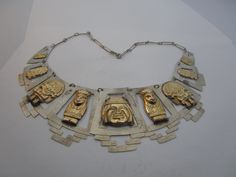 "19 1/2\" long.  2 3/8\" wide at the widest.  Used but very nice condition.  Fine quality.  Marked : .925, 18 K.  Signed :  K. I. , 9360.  5  different 2 each, 10 in all, Aztec images in gold. Nicely crafted." Vintage Gold Necklace Stamped 925, Aztec Images, Large Necklace, Aztec Design, Aztec Designs, Pendant Necklaces, Jewelry Necklace Pendant, 18k Gold, Jewelry Necklaces