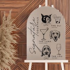 a sign with dogs and wine glasses on it