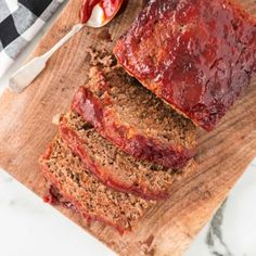 slices of meatloaf on a cutting board