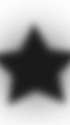 a black and white photo of a star