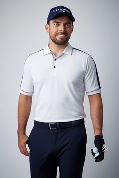 a man wearing a white shirt and blue pants is smiling at the camera while holding a golf club in his hand