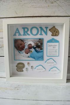 a baby's birth photo frame with an animal theme