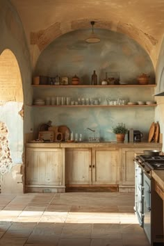 a kitchen with an arched ceiling and wooden cabinets