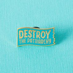 a blue shirt with the words destroy the patinarchy on it