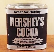 a can of hershey's cocoa sits on a table