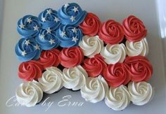 cupcakes with red, white and blue frosting arranged in the shape of roses