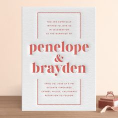 a card with the words penelope and brayden on it next to a small box