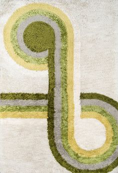 an abstract painting with green and yellow circles on white paper, in the shape of a letter p