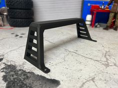 the front end of a motorcycle frame sitting on top of a table