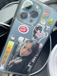 a cell phone case with stickers on it