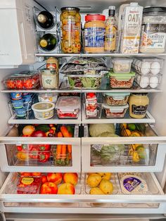 an open refrigerator filled with lots of food