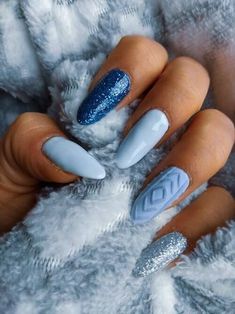 Looking for trendy winter blue nail designs? Check this post for the chicest 50+ blue winter nails, including navy blue winter nails, icy blue winter nails, baby blue winter nails, and more to copy directly. Winter Nail Ideas Simple Blue, Blue Winter Sweater Nails, Snowy Blue Nails, Pretty Winter Nails Classy Blue, Winter Nails Almond Shape Blue, Blue Christmas Nails Almond, Light Blue Holiday Nails, Winter Christmas Nails Blue, Light Blue Nails Winter