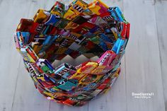 a colorful candy wrapper sitting on top of a wooden table