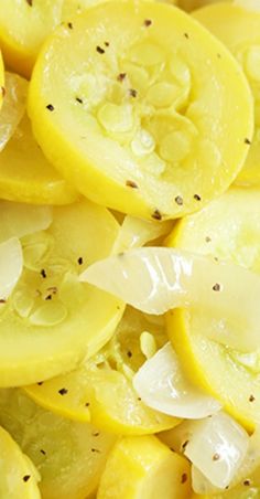 sliced up lemons and onions with seasoning on them