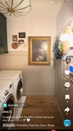 an image of a laundry room with pictures on the wall and washer dryer