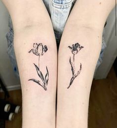 two small tattoos on both arms with flowers