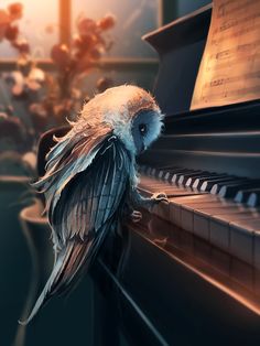 a bird sitting on the edge of a piano with music notes in it's back