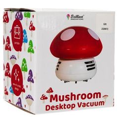 the mushroom desktop vacuum is red and white with trees on it's back side