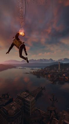 a man flying through the air while floating on top of a city next to water