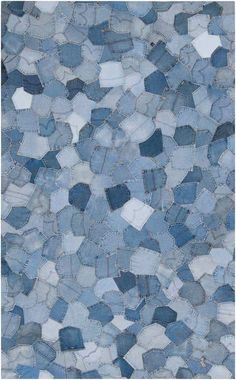 an image of a blue patchwork pattern made out of old denims or jeans