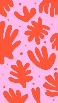 an orange and pink plant pattern on a purple background with black dots in the center