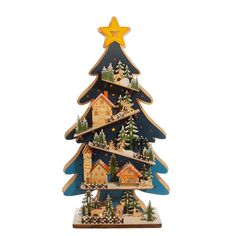 a wooden christmas tree with houses on it