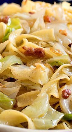 pasta with bacon, cabbage and other toppings on a plate