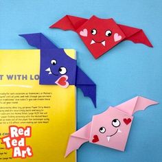 three origami bats with love written on the front and one red ted art book