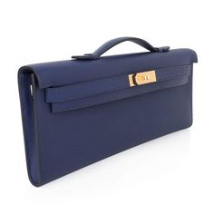 Hermes Kelly Cut Bag Blue Encre Clutch Swift Gold Hardware New - mightychic Elegant Pouch-style Business Clutch, Elegant Business Clutch In Pouch Shape, Elegant Business Clutch Shaped As A Pouch, Luxury Blue Pouch Clutch, Luxury Blue Clutch For Travel, Elegant Rectangular Case Bag With Magnetic Closure, Elegant Rectangular Bag With Magnetic Closure, Luxury Blue Rectangular Clutch, Classic Blue Clutch For Travel