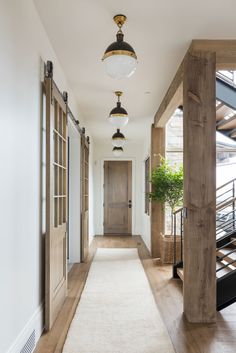 the hallway is clean and ready for us to use as an entrance way in this home