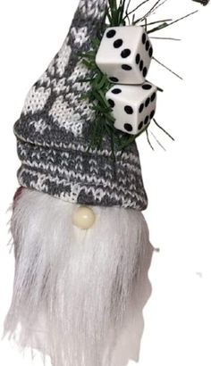 a gnome hat with dice on top of it