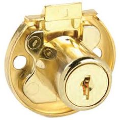 an image of a golden door knob with keys on the front and side lock in the middle