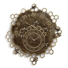 an old clock is shown with numbers and symbols on the face, as well as hexagonals