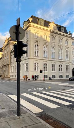 an image of a city street with buildings in the background and words written on it