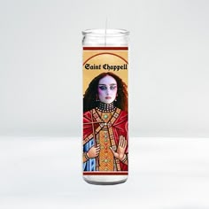 a candle with an image of saint chapell on it