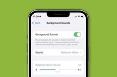 an iphone with the sound recorder app on it's screen, next to a green background