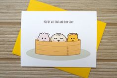 a card with three little birds sitting in a wooden box on top of a table