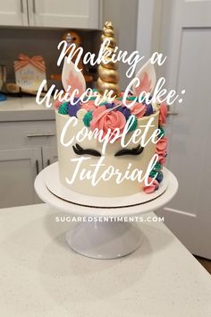 a unicorn cake with the words making a unicorn cake complete guide on top of it