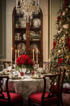 a dining room table set for christmas dinner