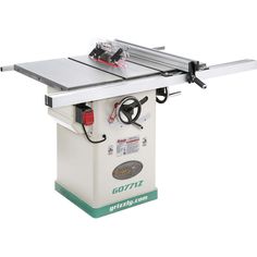 a table saw is sitting on top of a white box with a corded handle